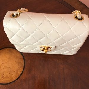 Chanel quilted lambskin mini flap bag.